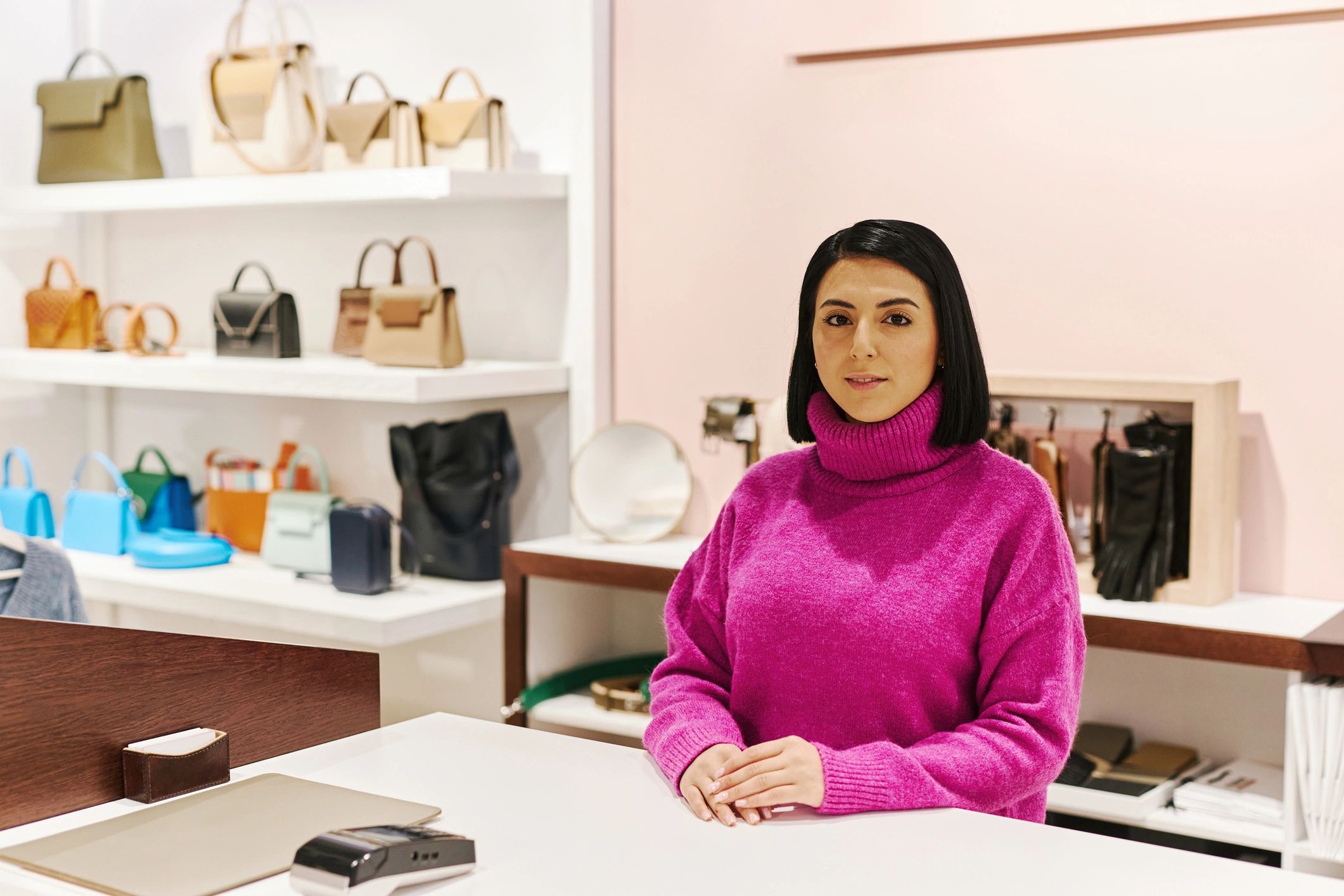 Woman working in a stylish clothing boutique