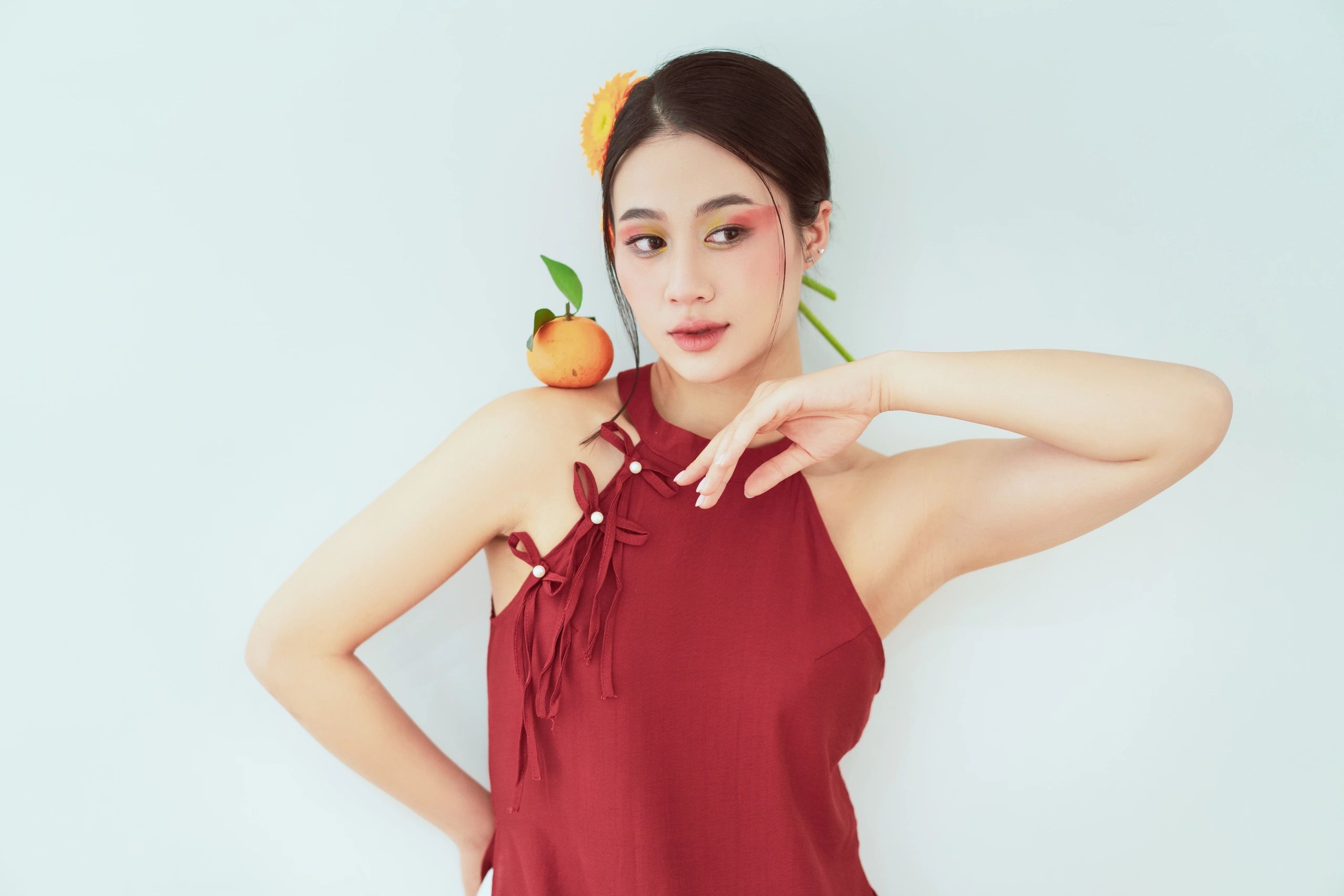 Woman in an elegant red dress for fashion styling inspiration
