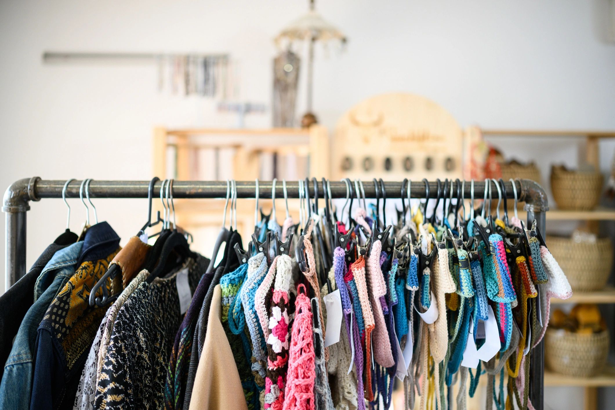 Boutique clothing rack with colorful dresses and curated fashion pieces